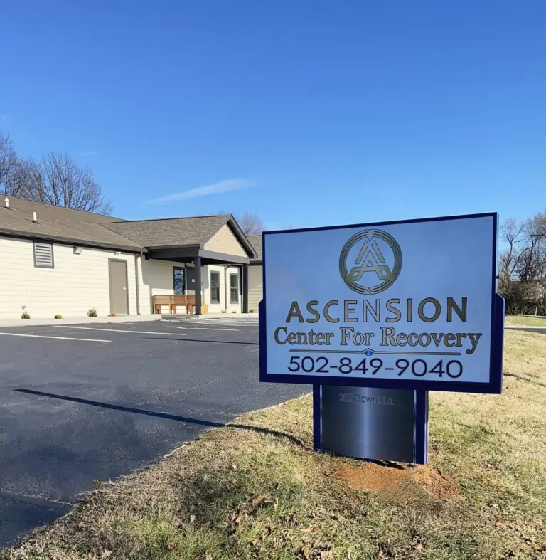 Cream single-story recovery center building with a monument sign reading Ascension Center For Recovery