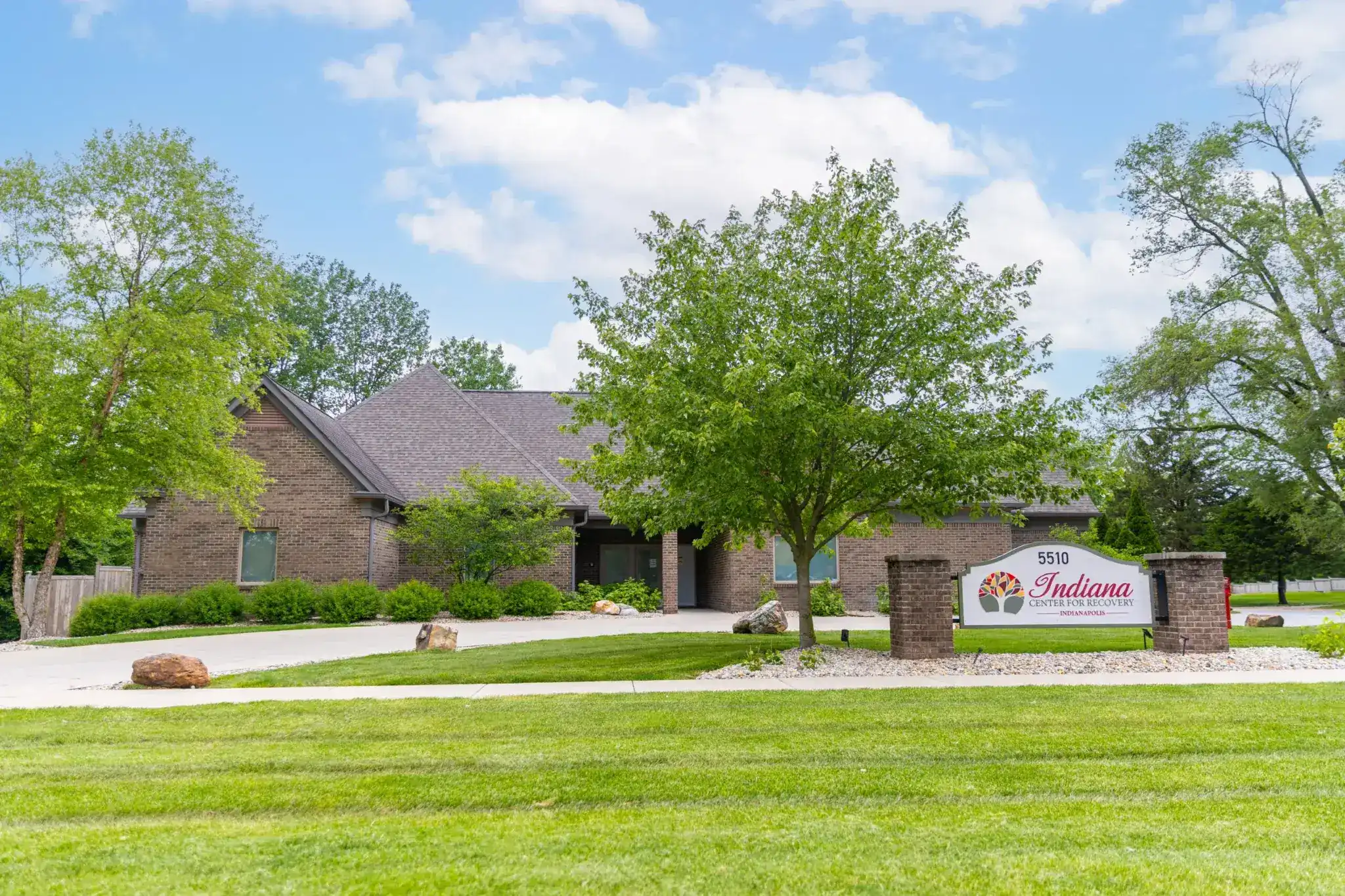 Brick recovery center building with a Indiana Center for Recovery Indianapolis sign and 5510 address