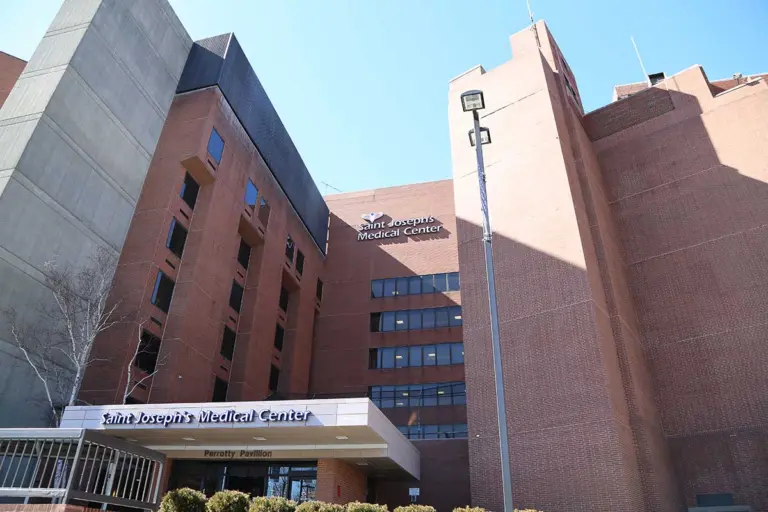 Brick hospital building with a Saint Joseph's Medical Center sign above the Perrotty Pavilion entrance